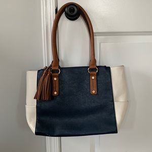 Navy, white and camel colored purse
